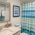 Large bath with single vanity and large mirror