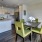 Open living room open to the dining room and kitchen bar