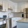 Open kitchen and living room with plenty of natural light.
