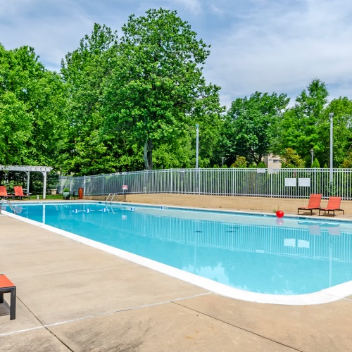 Pool Large pool with poolside lounge chairs